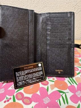 CHANEL Black Quilted Leather Wallet Phone Case with Gold Logo